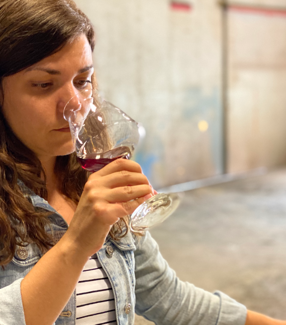 Woman holding glass 2x